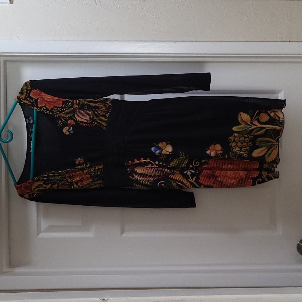 Desigual long sleeved sheer lined dress. Scooped neckline, knee length.